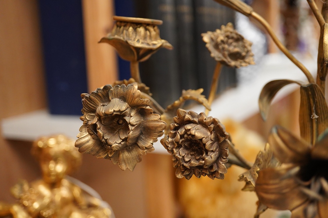 A pair of 19th century brass four light figural candelabra with inset enamel plaques, 48cm high